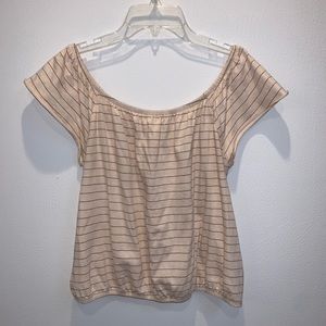 Off the shoulder tan and red striped shirt